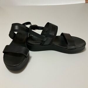 Black Platform Strap Sandals, Size 38/7.5.
Fisherman Sandals